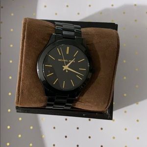 Beautiful black and gold watch.